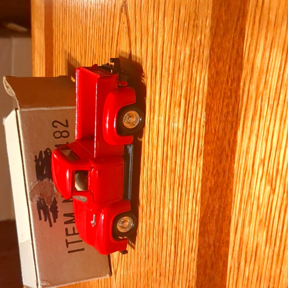 1956 Ford pickup truck in cherry red  1.32 scale. F 100